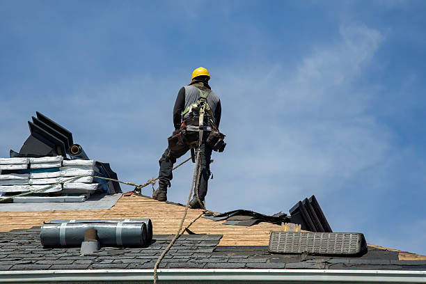 Professional Roof Replacement technician working in Fromberg, MT